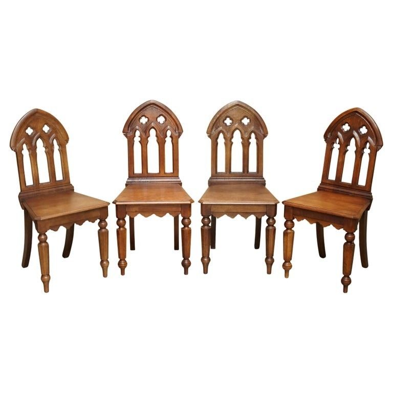 Four Circa 1920 English Oak Hand Carved Gothic Revival Steeple Back Hall Chairs