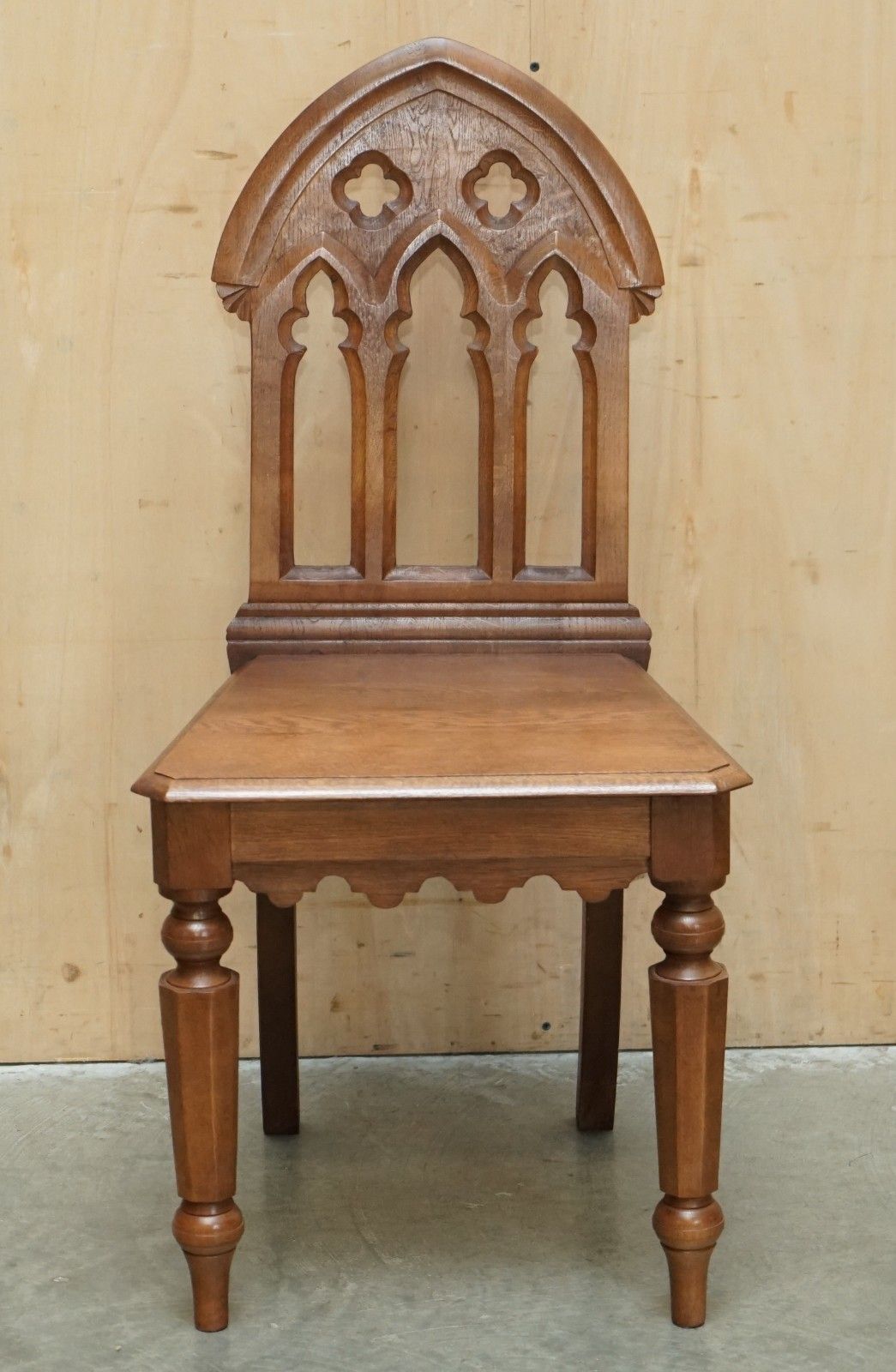 Four Circa 1920 English Oak Hand Carved Gothic Revival Steeple Back Hall Chairs photo for sale