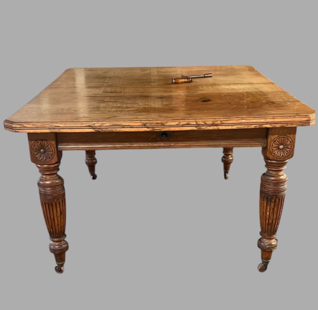 A Characterful Antique Oak Dining Table With Extending Leaves photo furniture