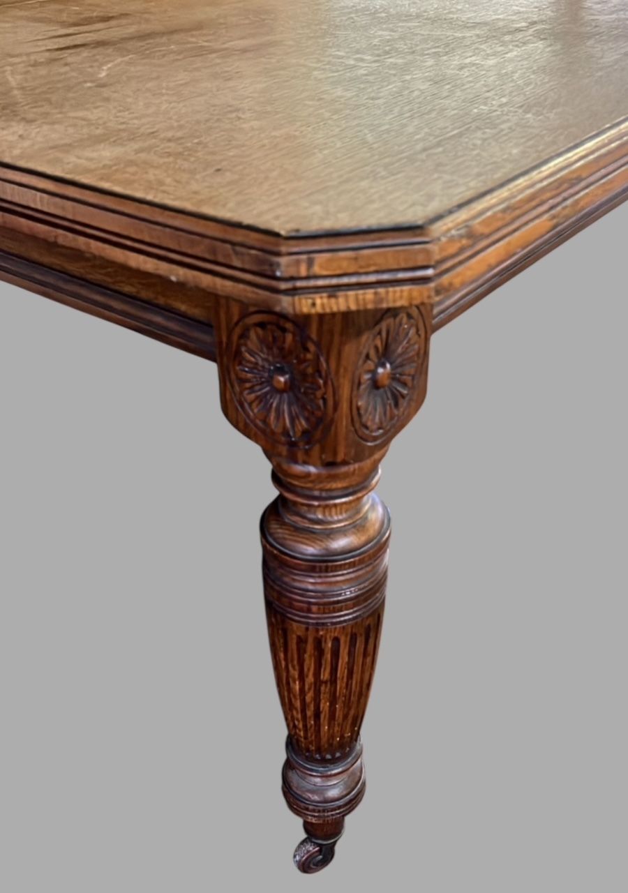 A Characterful Antique Oak Dining Table With Extending Leaves photo 1995.0