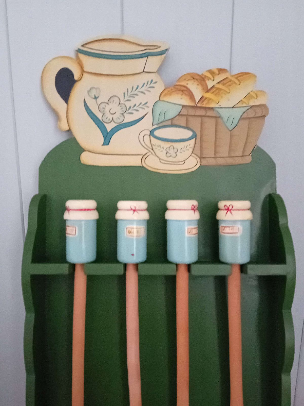 Kitchen Utensils Made Of Wood With Decorative Hanging Rack