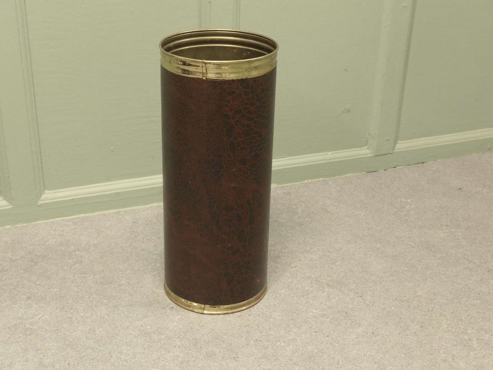 Mid Century Stick Stand Made In Brass And Leather photo furniture