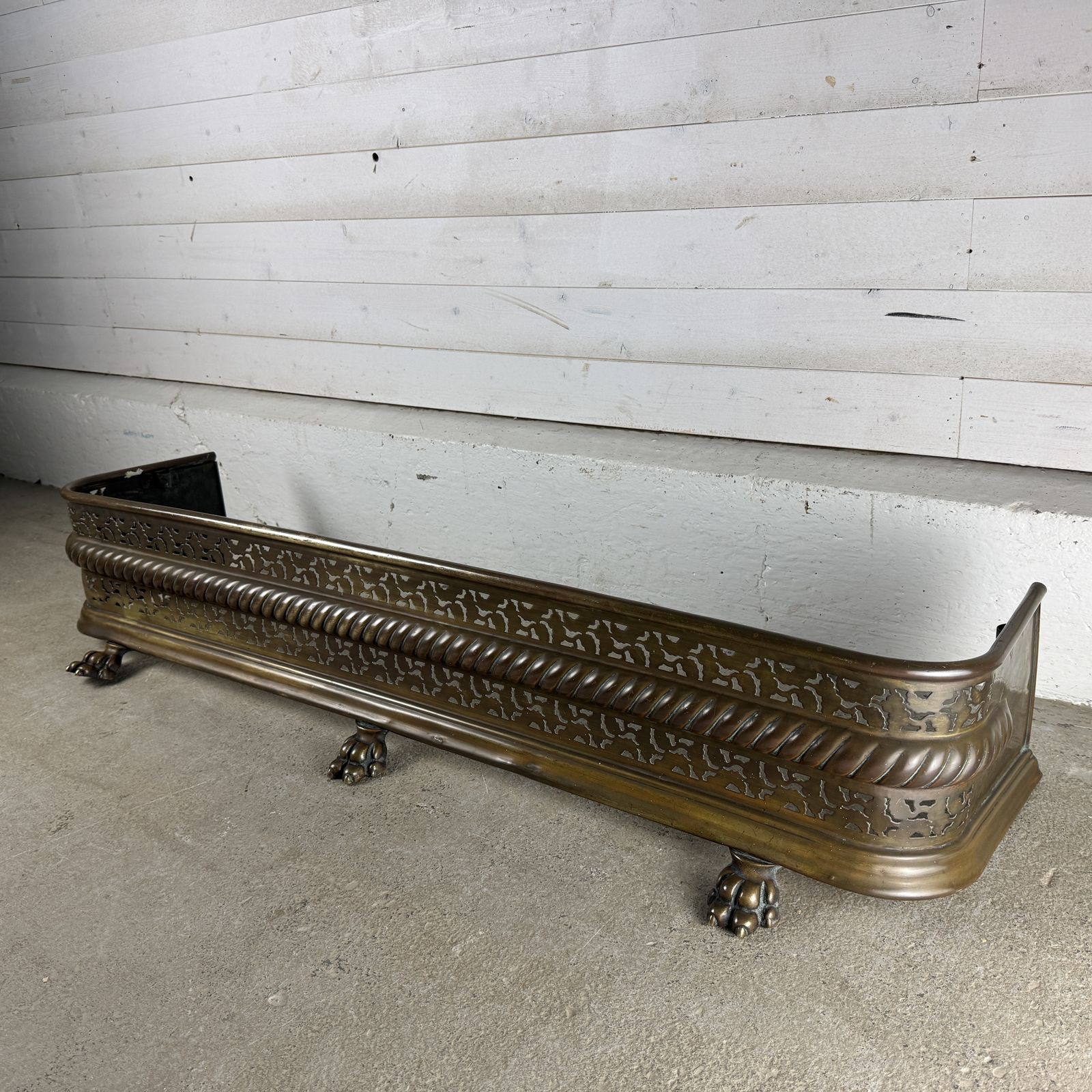 Antique Brass Fender With Lion Paw Feet photo for sale