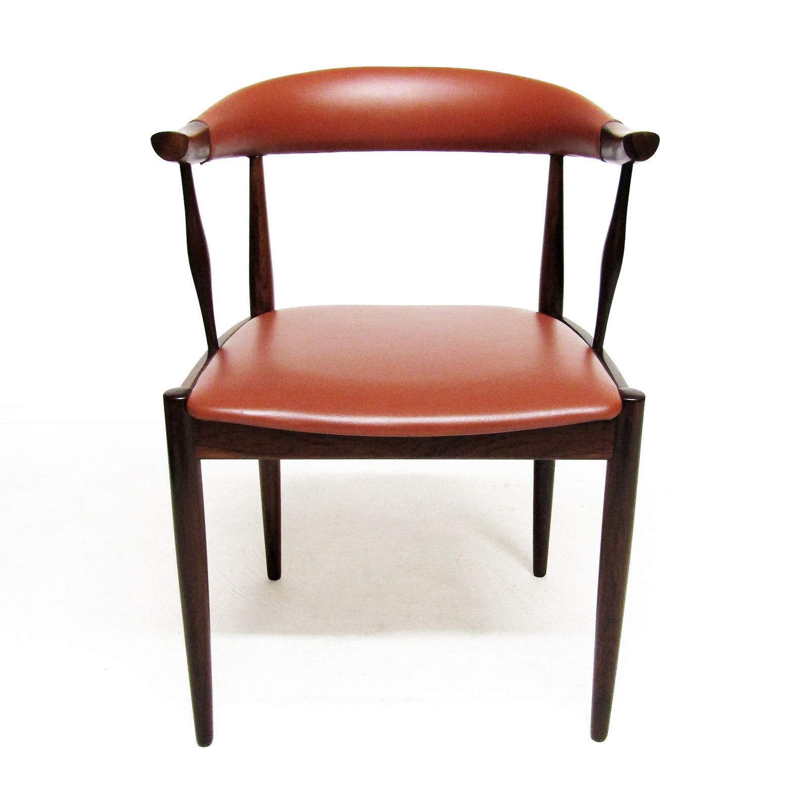photo furniture Set Of Eight Danish Cow Horn "Model 12" Chairs In Rosewood By Johannes Andersen