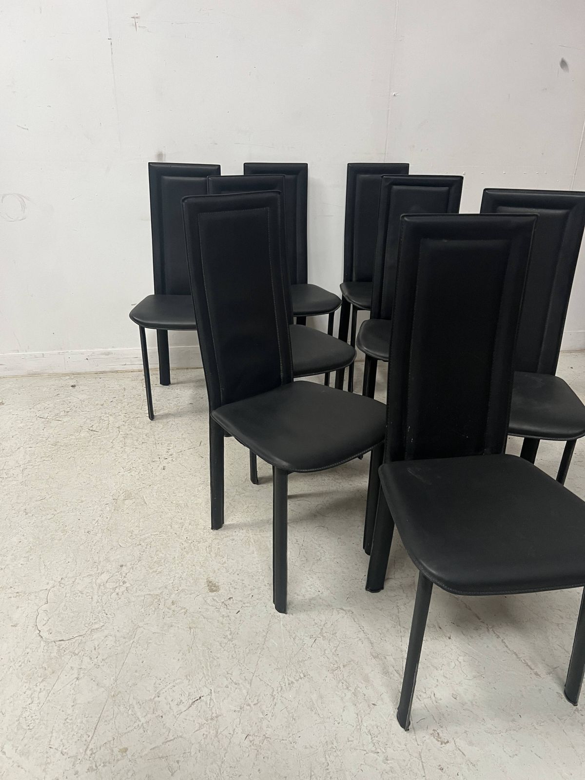 Set Of Eight Designer Chairs In Black Leather From The 20th Century photo furniture