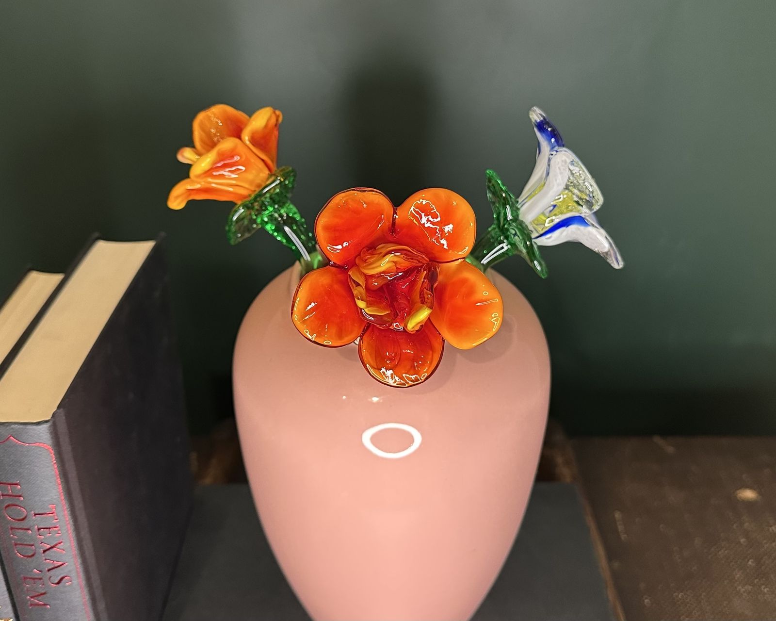 A Collection Of Colourful Mouth Blown Glass Flowers
