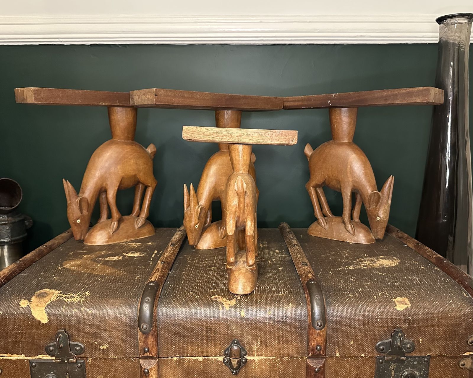 An Odd Collection Of Hand Carved Antelope Sculptures photo for sale