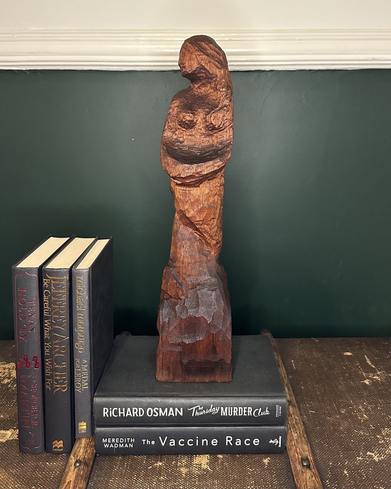A Hand Carved Wooden Sculpture Depicting A Mermaid photo 50.0