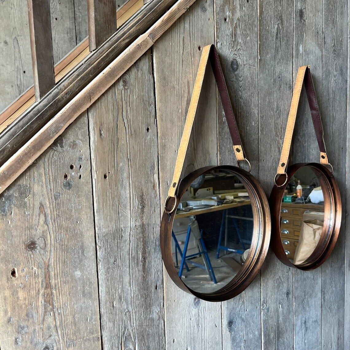 A Pair Of Wall Hanging Circular Metal Framed Mirror With Hanging Strap photo buy