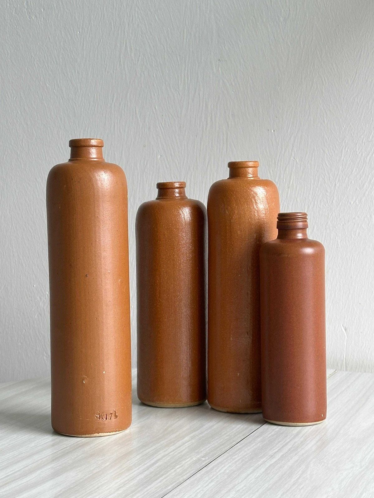 Set Of Old Stoneware Bottles, Brutalism Decoration, Minimalist Design, Creative Studio Interior, Retro Object, Wedding Decor photo Home Decor