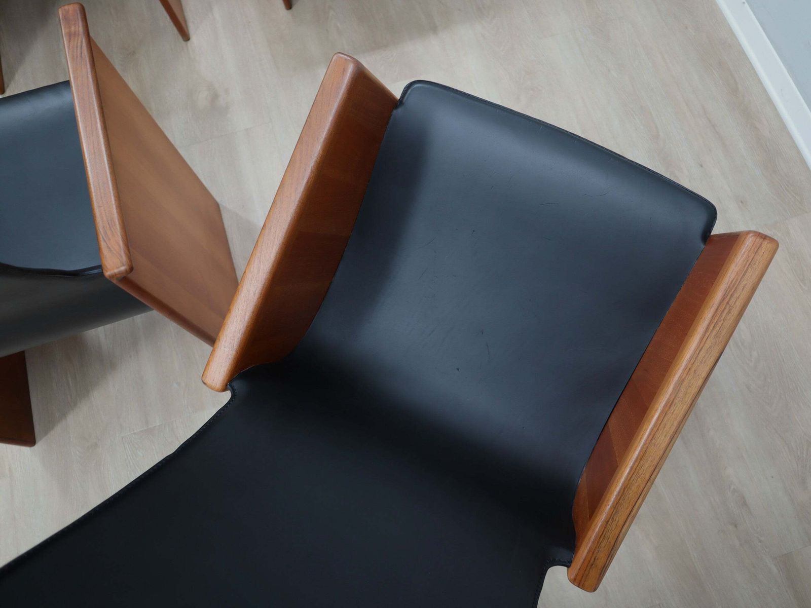 photo buy Set Of 4 Segesta Walnut And Black Letaher Chairs Stildomus 1970s