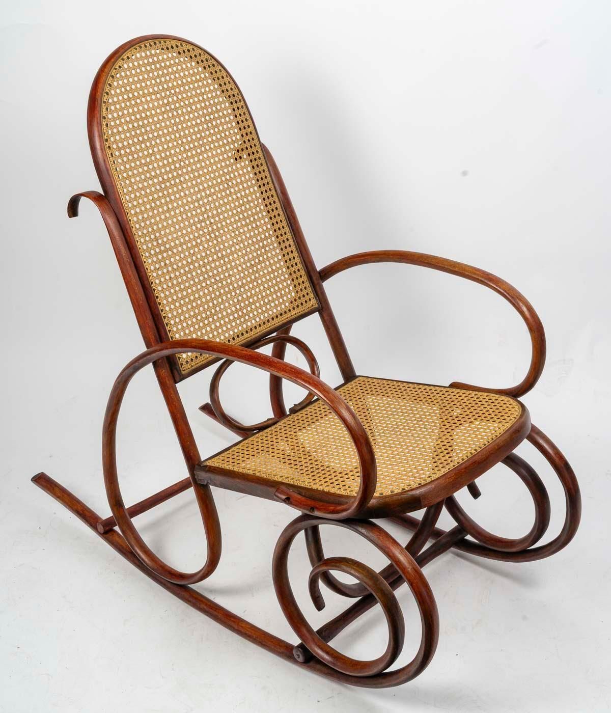 Rocking Chair In Turned Wood, Canework, Early 20th Century. photo Furniture
