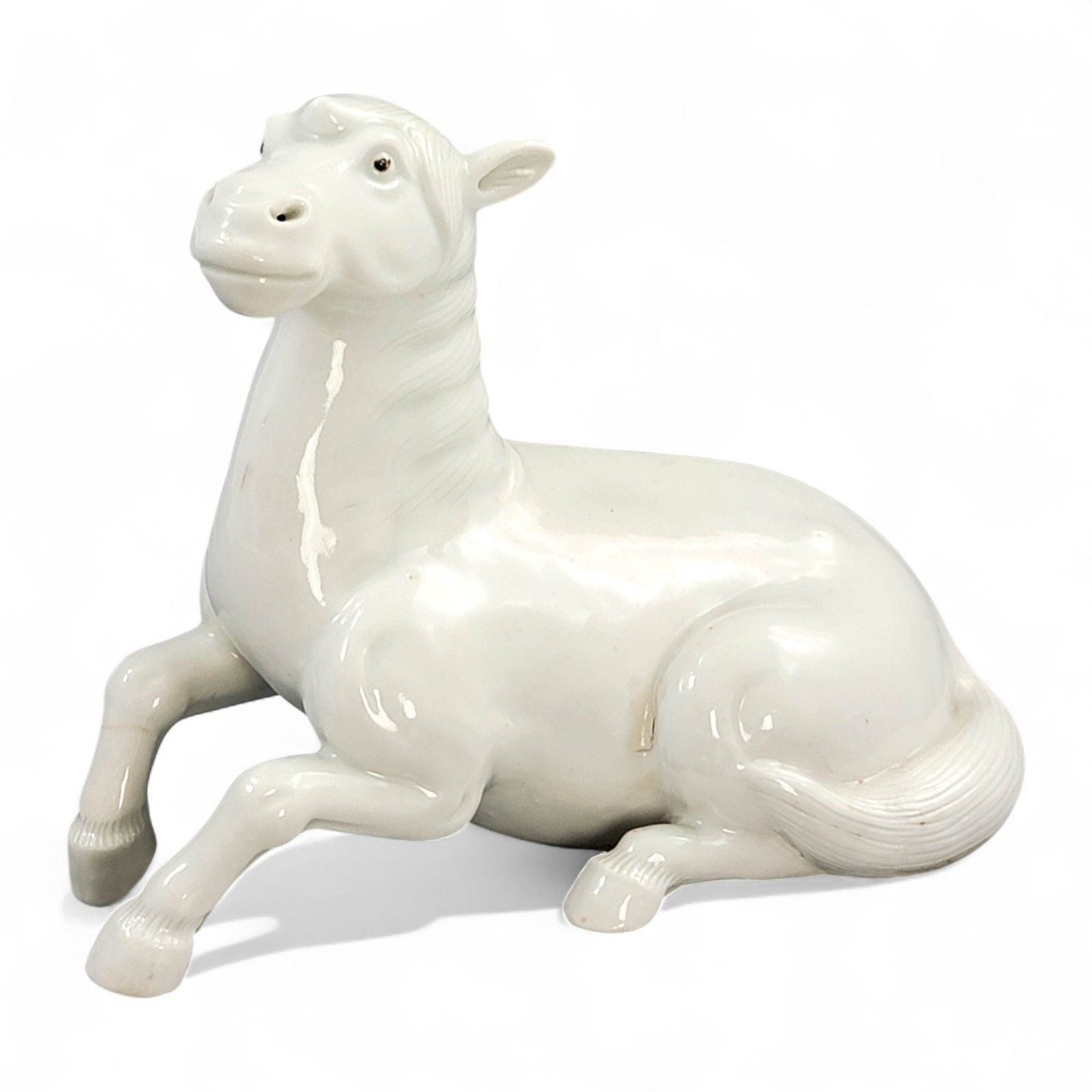 Hirado Porcelain Recumbent Horse, Japan, Late 19th Century