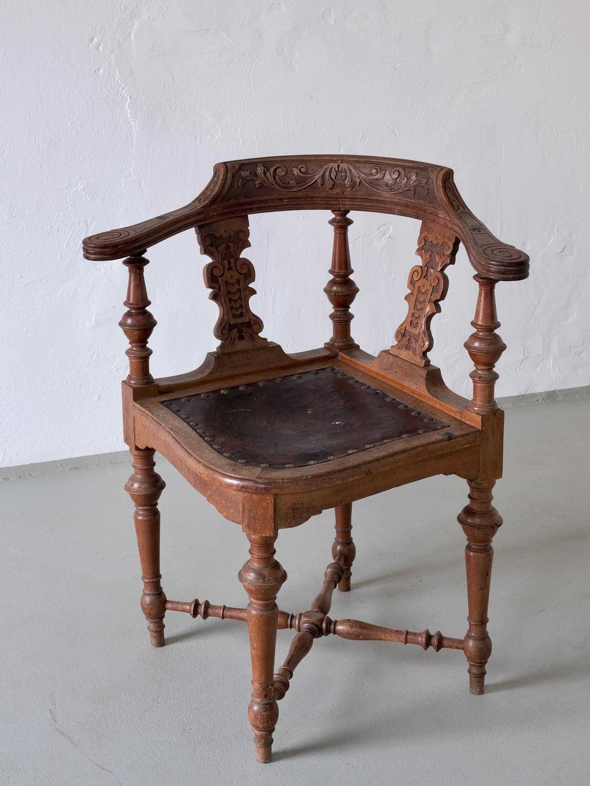 Antique Carved Corner Chair With Leather Seat photo furniture
