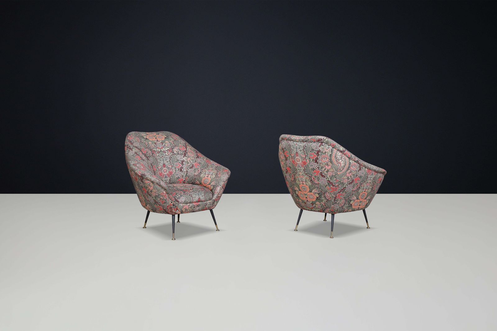 photo furniture Federico Munari Armchairs In Original Floral Upholstery With Brass Feet.