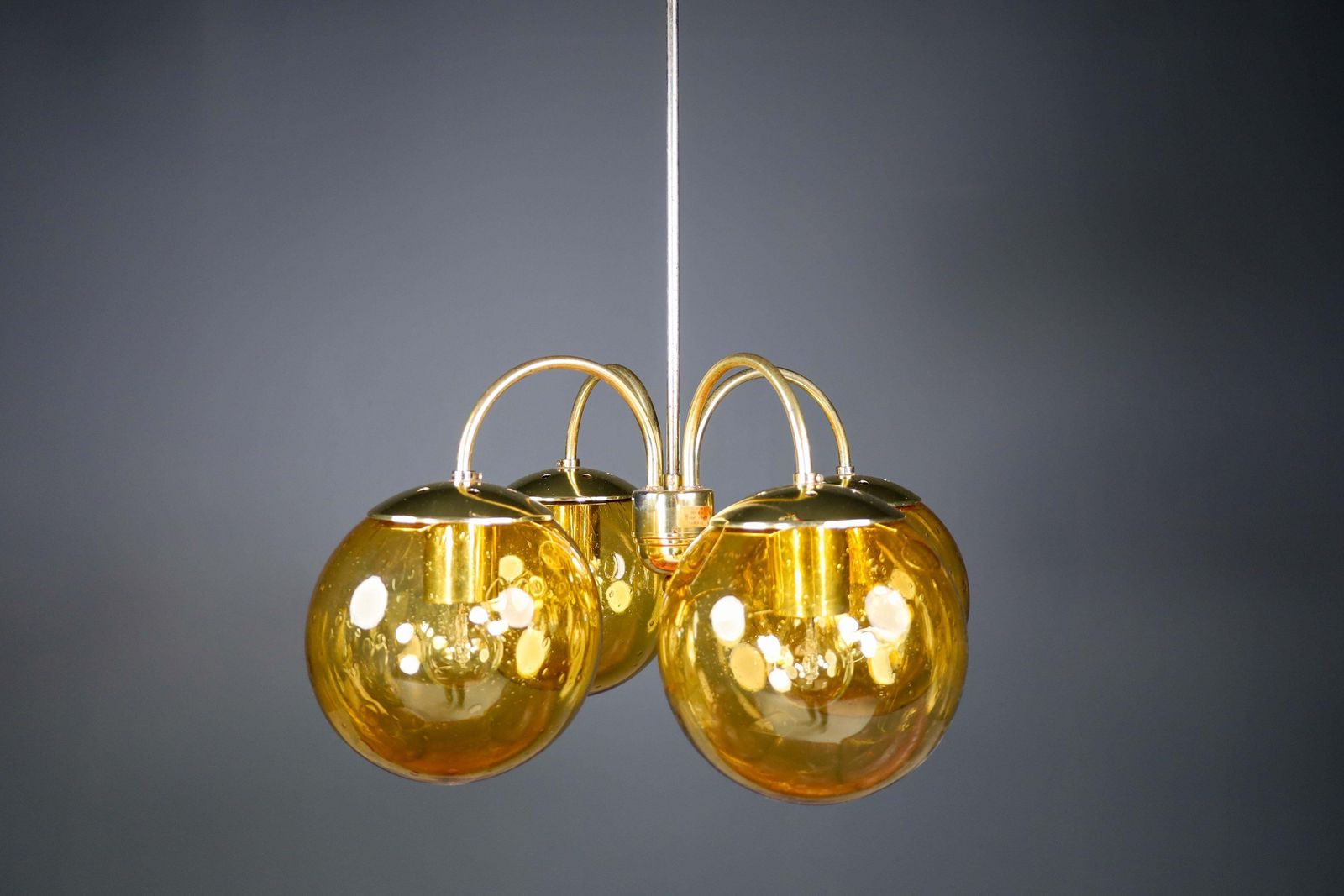 photo for sale Large Chandelier In Amber Hand Blown Colored Glass Globes & Brass, Europe, 1970s