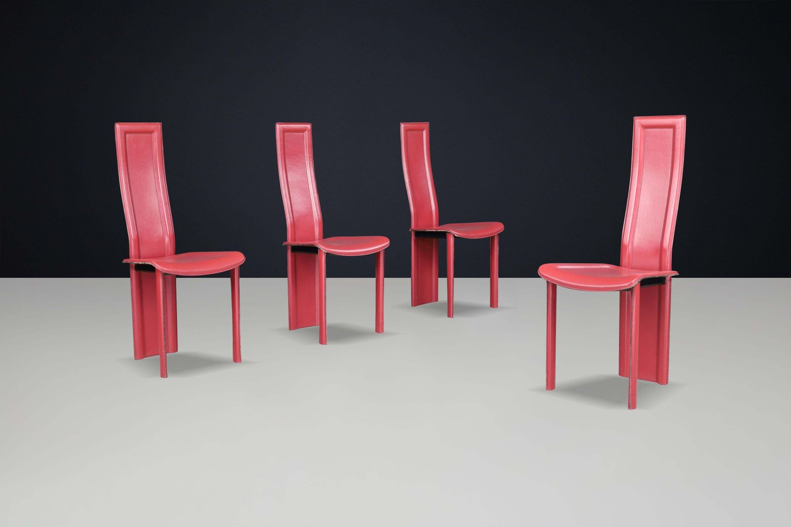 photo furniture Red Leather ‘Alice’ High Back Dining Chairs By Giorgio Cattelan, Italy, 1980