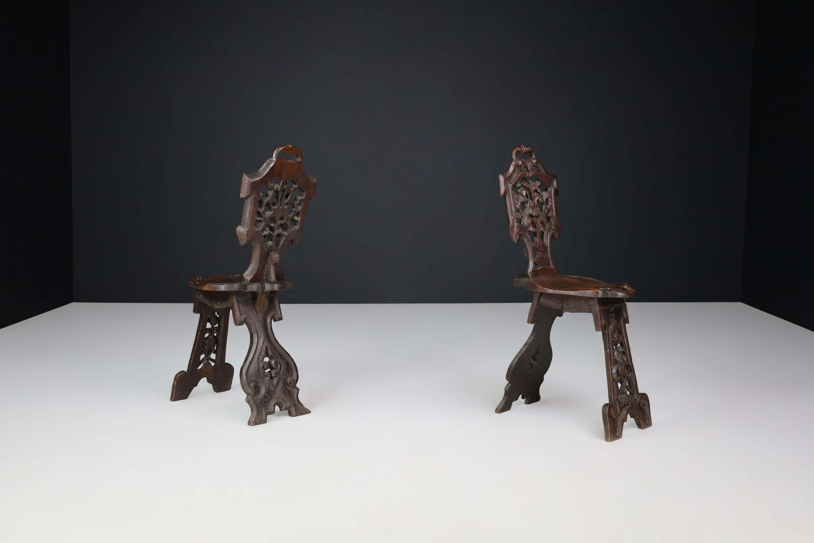 Antique Pair Of Figural Heavily Carved Oak Sgabello Chairs Italy photo for sale