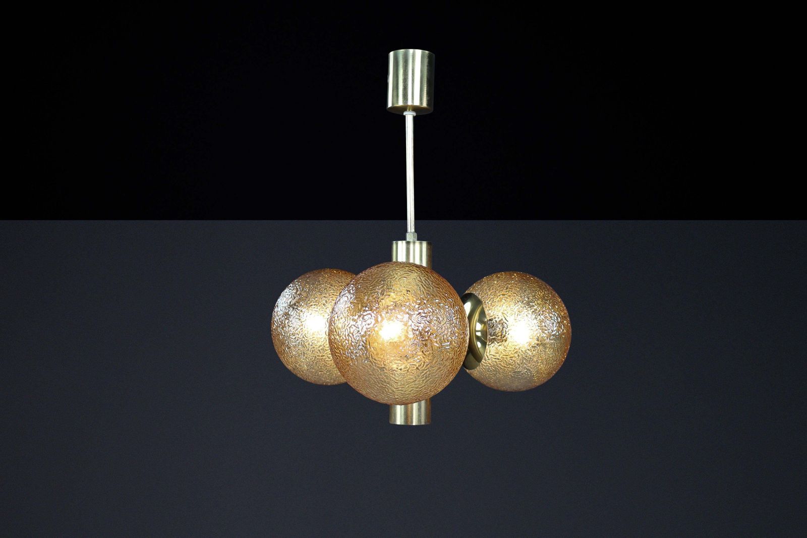 photo furniture Patinated Brass Sputnik Chandelier With 3 Gold Colored Globes, Germany 1960s