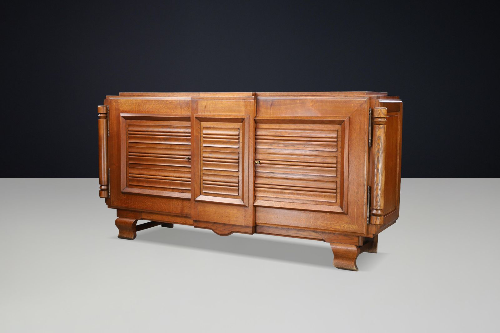 French Art Deco Patinated Oak Sideboard With Relief Carved Doors, 1940s photo for sale