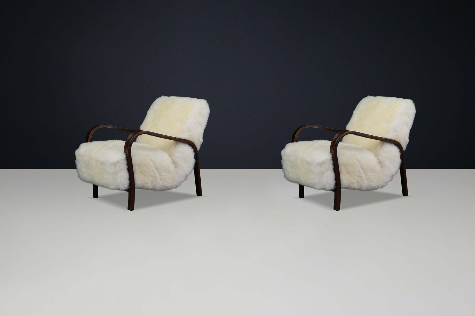 1940s Kozelka & Kropacek Armchairs In Ivory Texel Sheepskin Dark Patinated Frame photo for sale