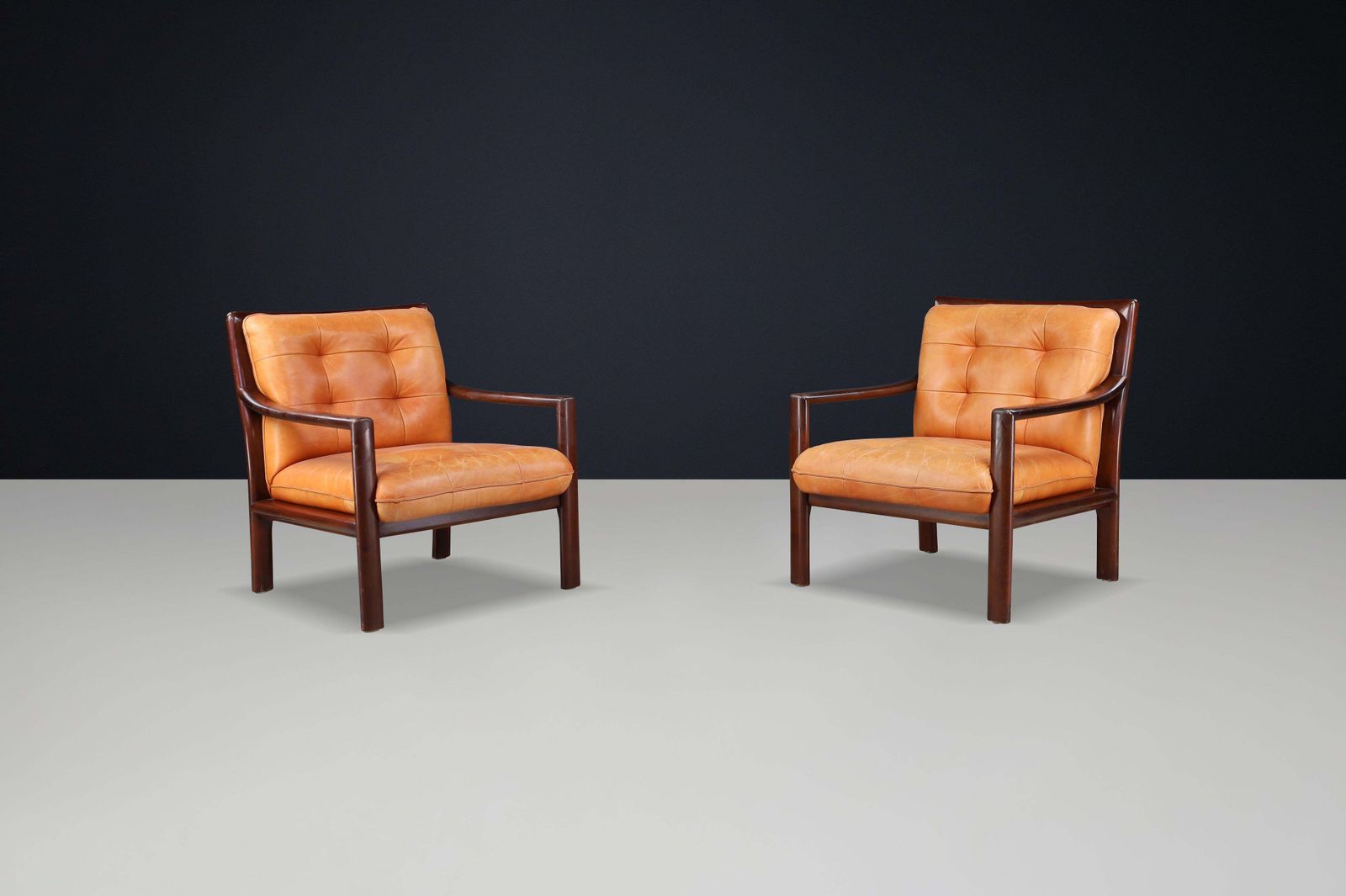 Pair Of Mid Century Lounge Chairs In Cognac Leather & Mahogany Stained Hardwood photo furniture