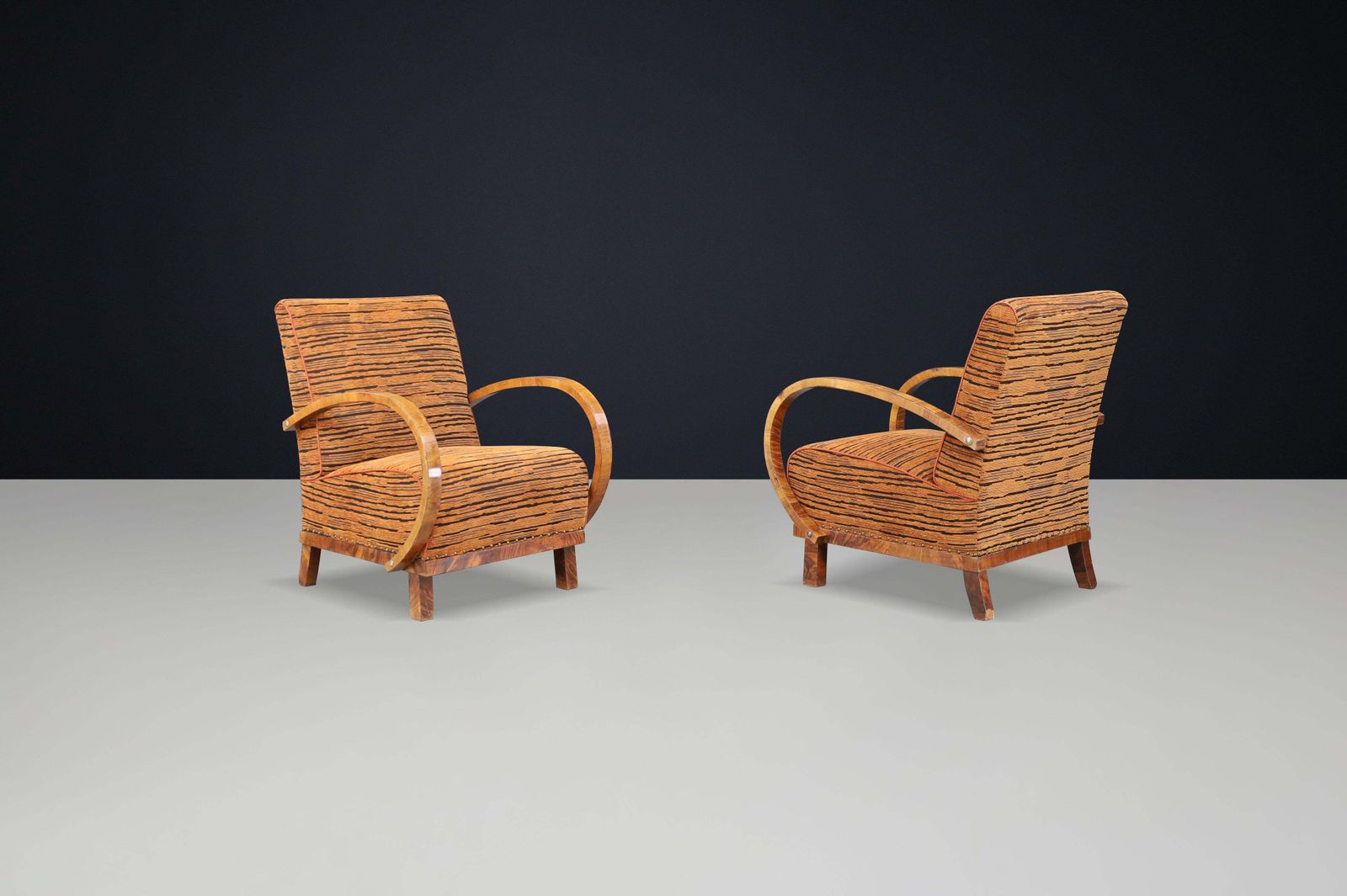Striking Pair Of Austrian Art Deco Lounge Chairs In Walnut With New Tiger Fabric photo for sale