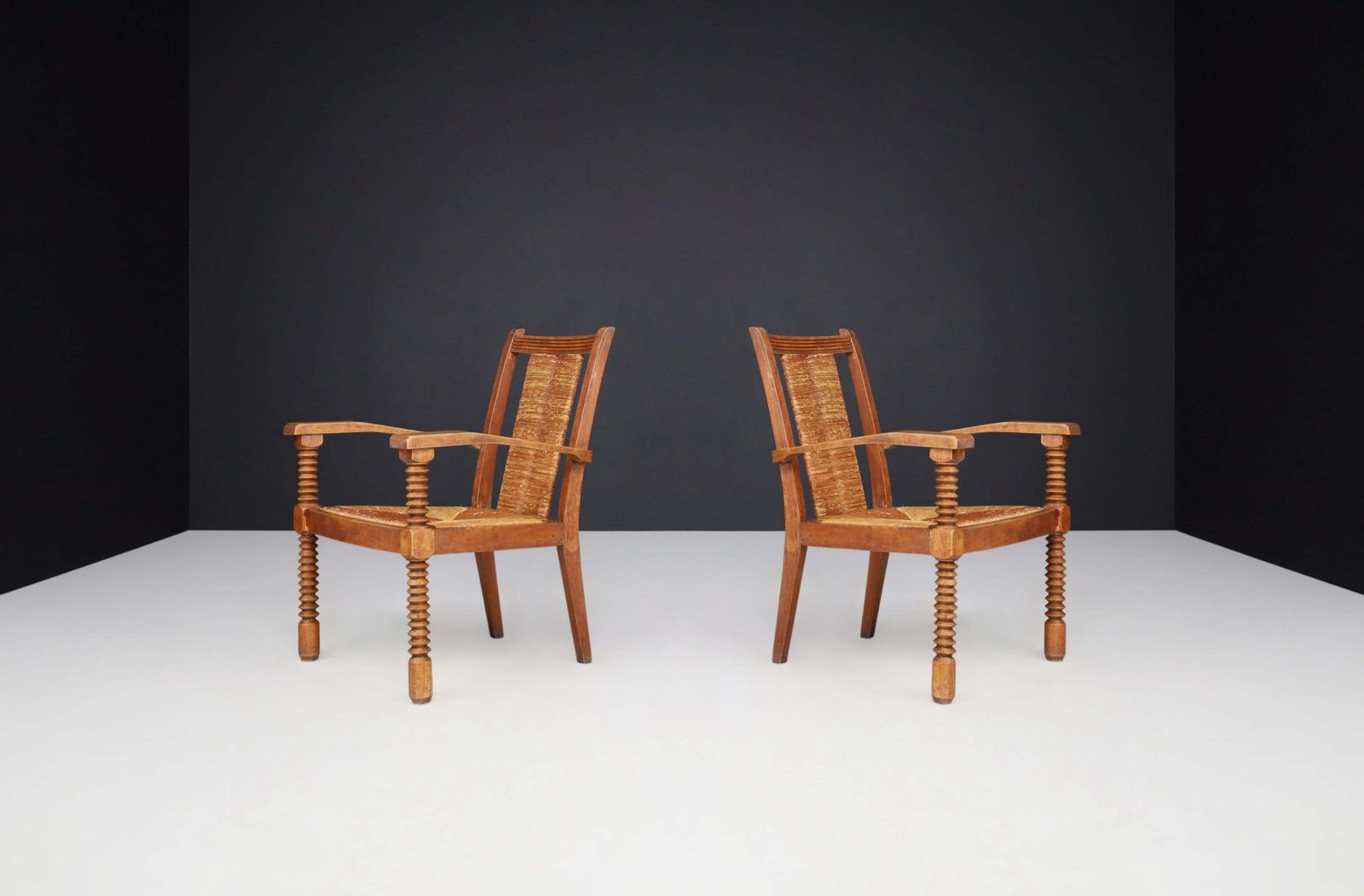 Charles Dudouyt Patinated Oak And Rush Armchairs, France 1940s photo furniture