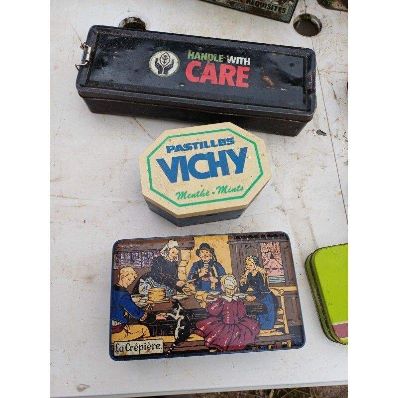 photo furniture Lot Of Vintage Tin Advertising Boxes