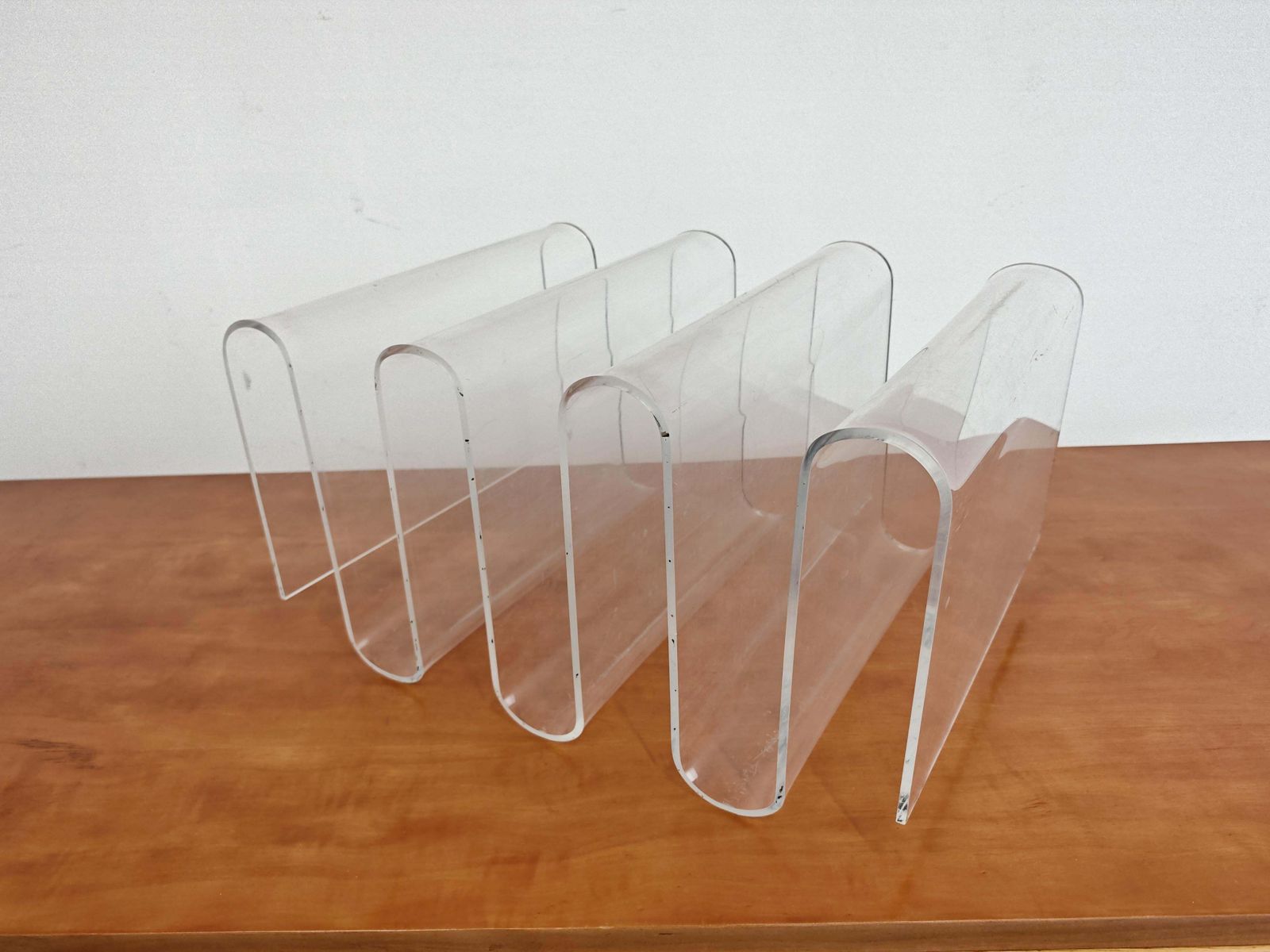 photo furniture Mid Century Modern Sculptural Magazine Rack Done In Plexi, Italy 1970s