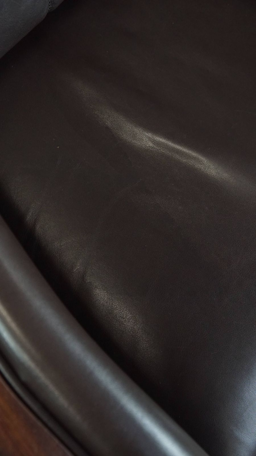 photo furniture Luxurious Art Deco Design Armchair With Dark Brown Leather With Decorative Stitching