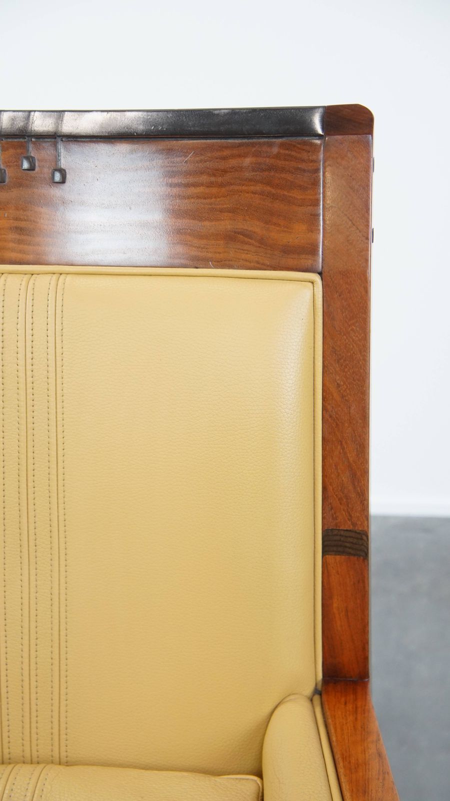 photo furniture Beautiful Art Deco Design Armchair In Yellow Leather With A High Back