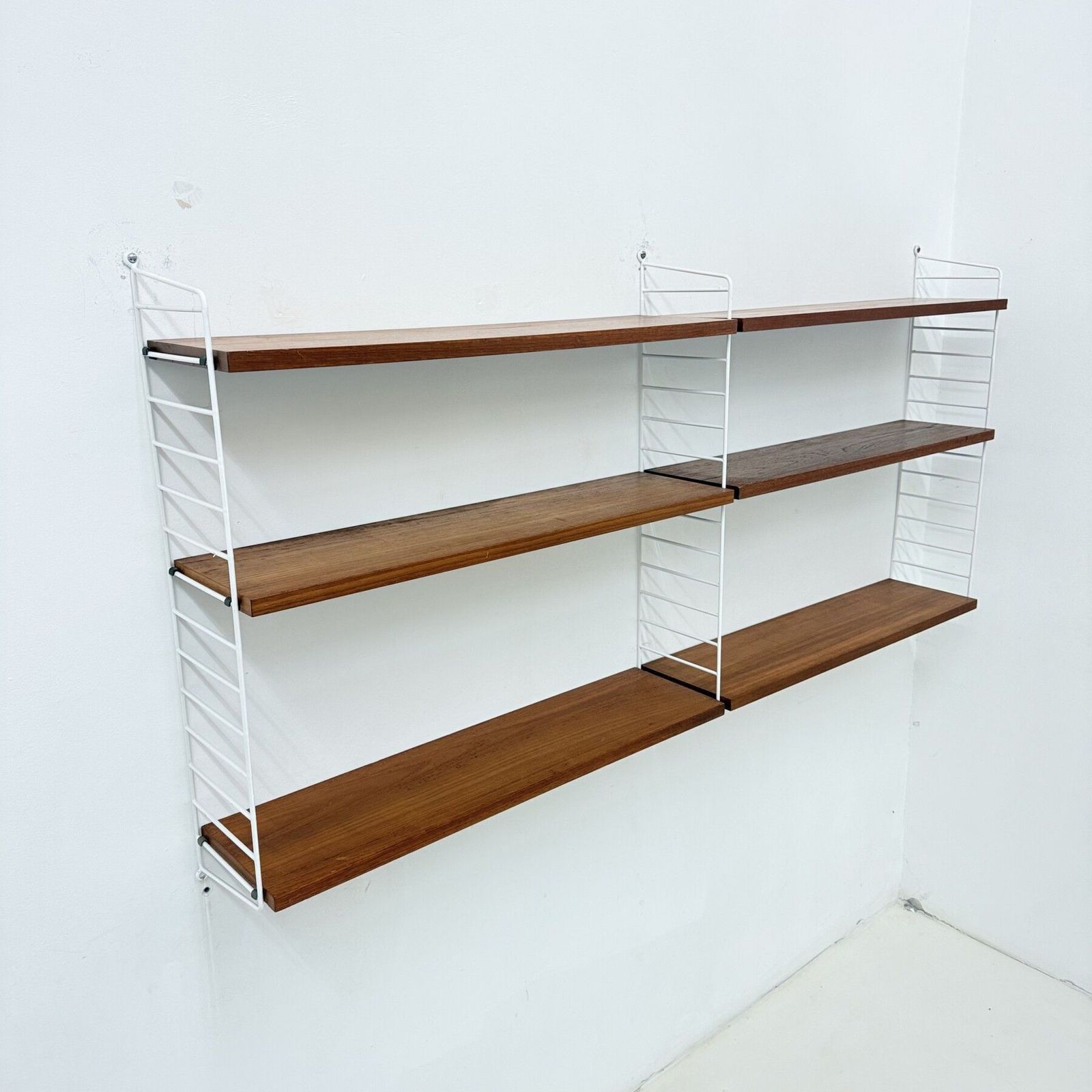 photo furniture Mid Century Nisse Strinning String Design Teakhouten Wandmeubel, Ca. Jaren 1960