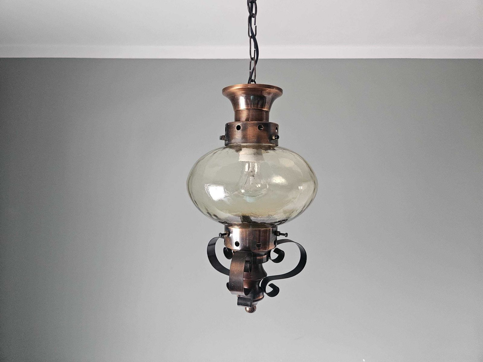 Vintage Copper Pendant Light: Amber Glass Globe, Wrought Iron Lantern