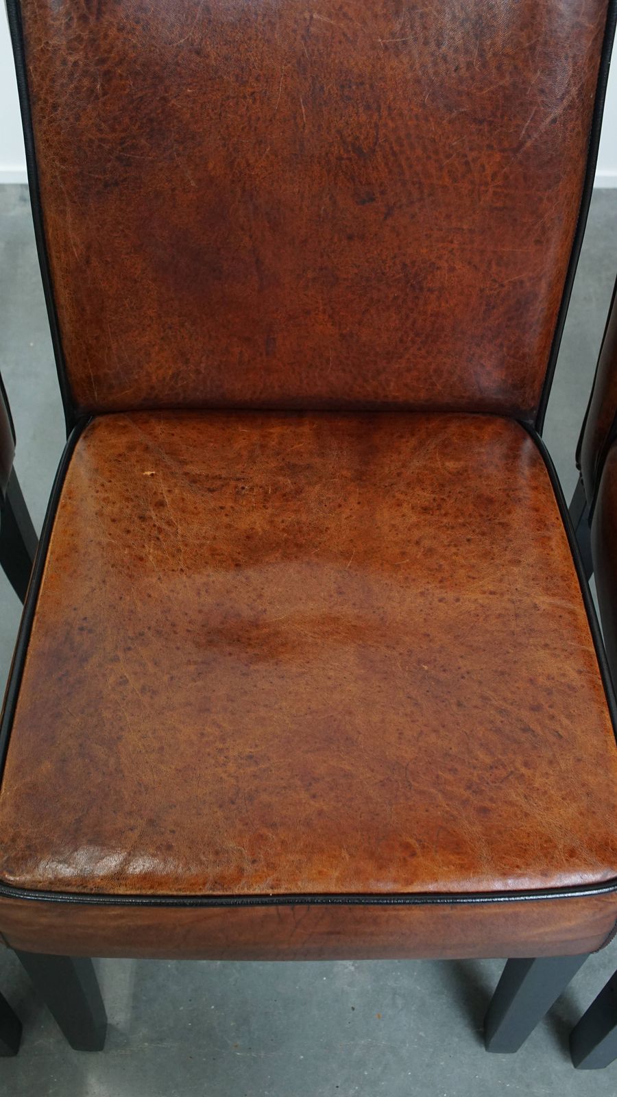 Luxurious Set Of 4 Comfortable Dining Chairs Made Of Sheepskin Finished With Black Piping photo buy
