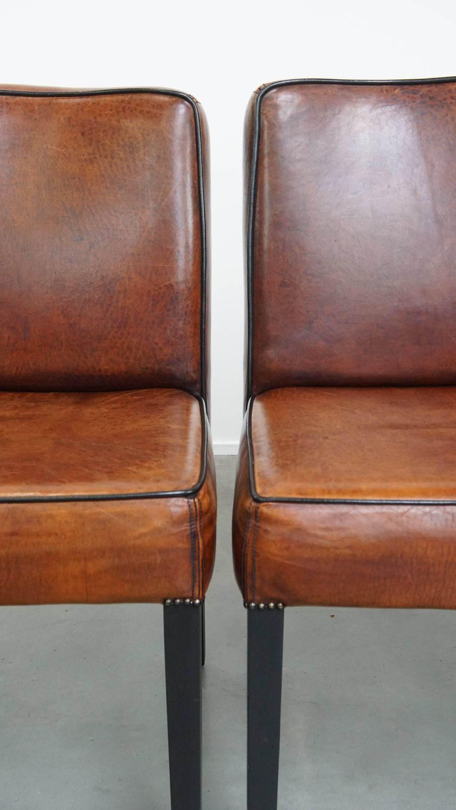 Furniture Luxurious Set Of 4 Comfortable Dining Chairs Made Of Sheepskin Finished With Black Piping photo