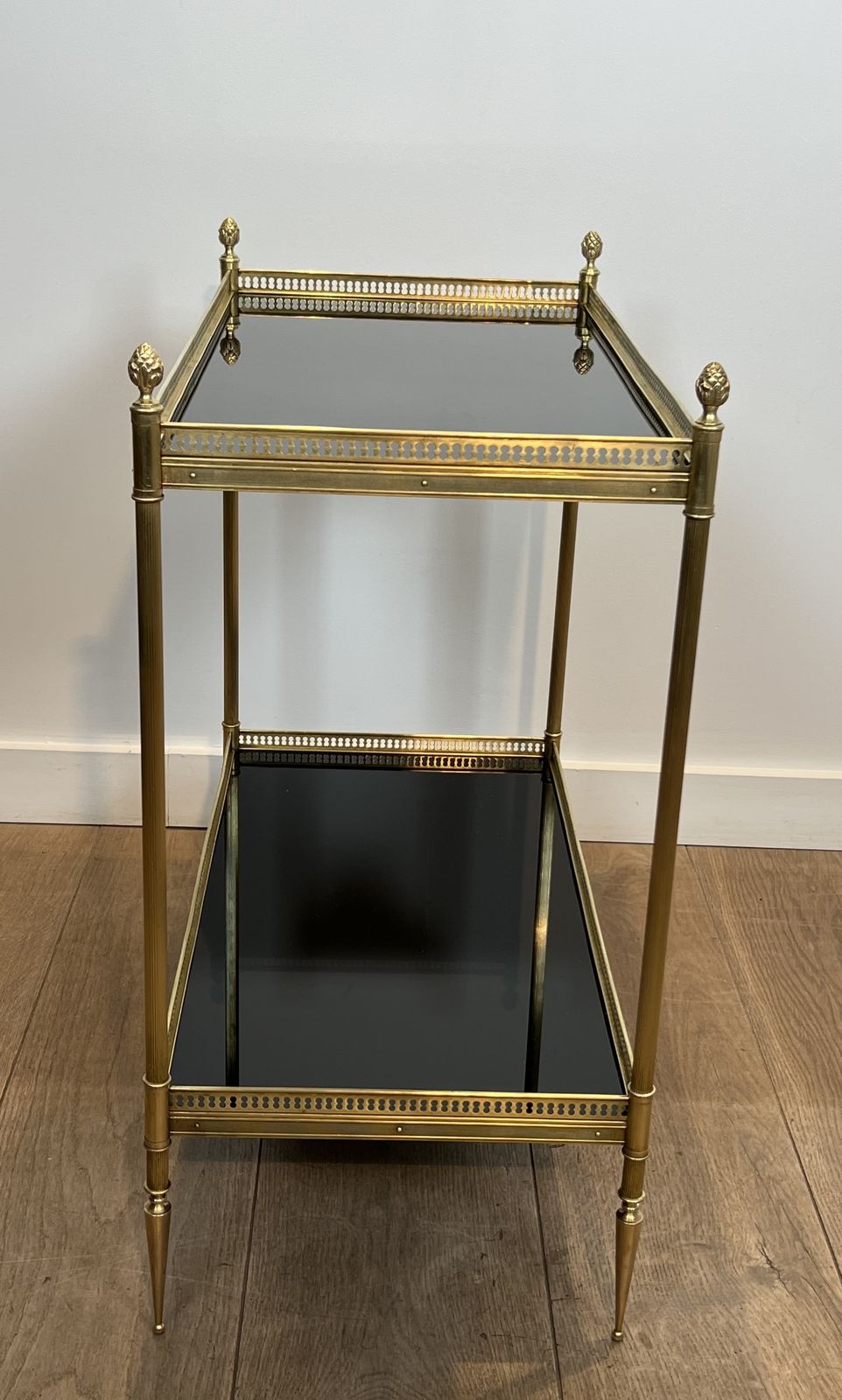 photo vinterior Pair Of Neoclassical Style Brass Side Tables With Black Lacquered Glass Top By Maison Jansen