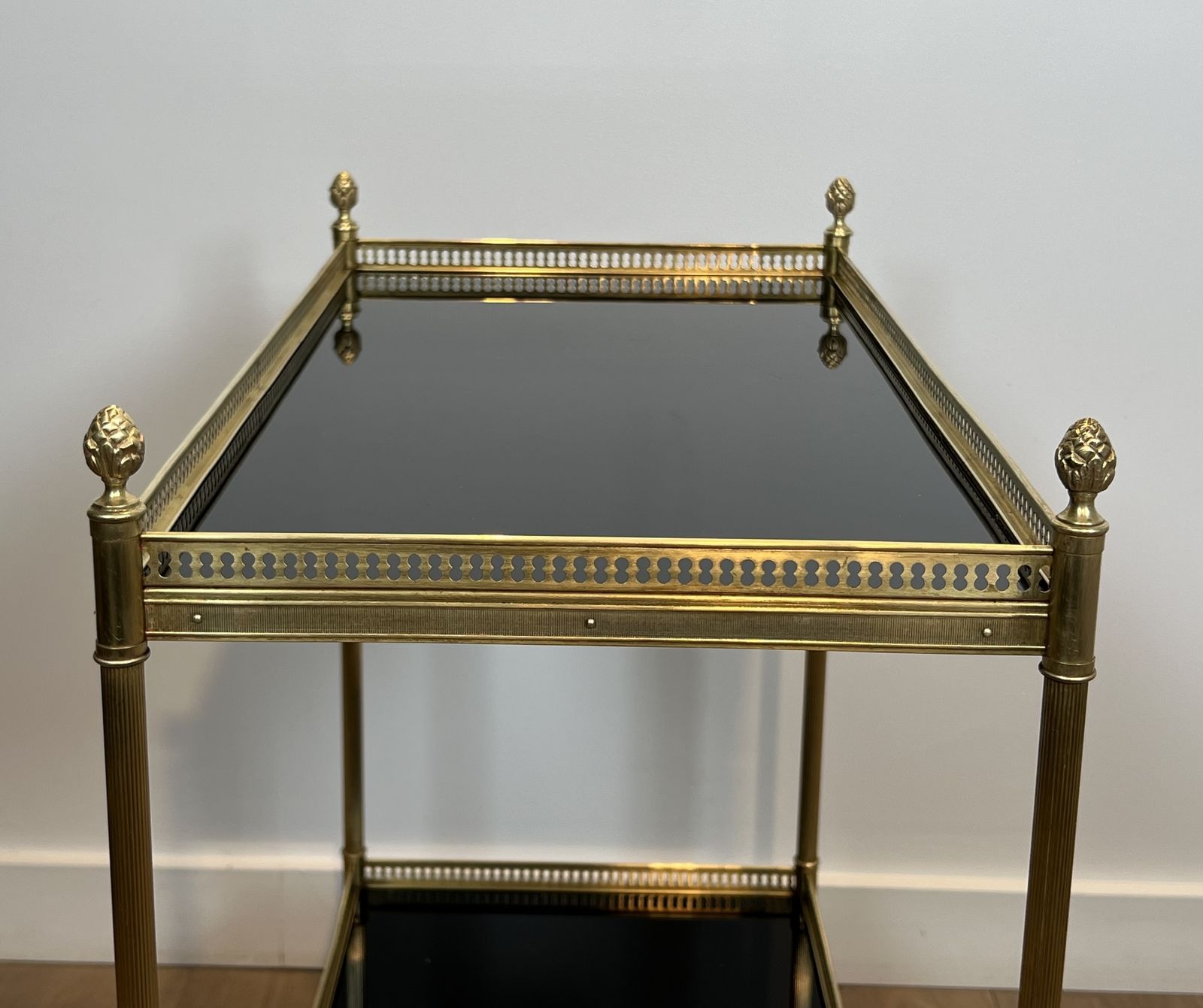 photo buy Pair Of Neoclassical Style Brass Side Tables With Black Lacquered Glass Top By Maison Jansen