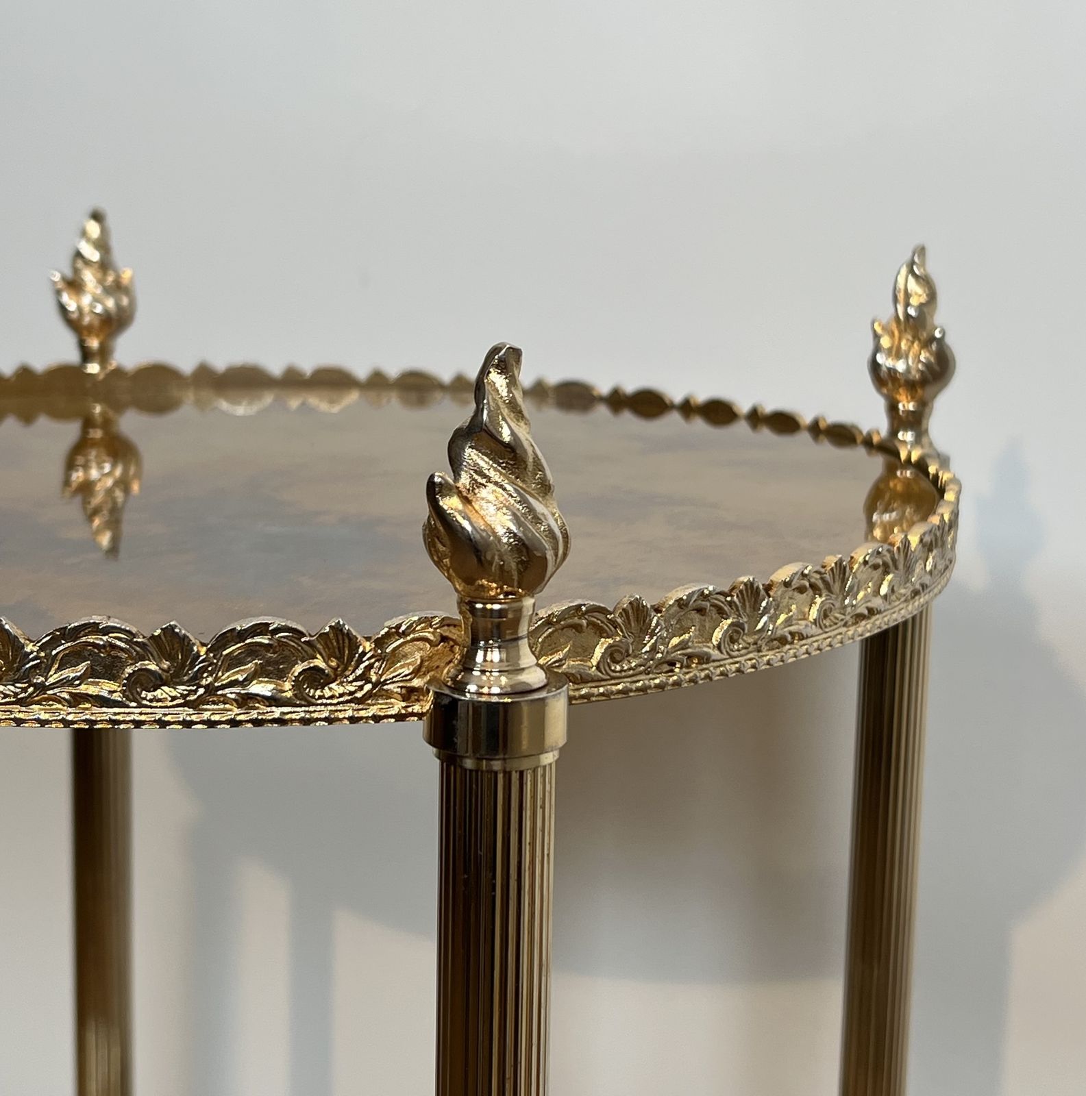 photo furniture Round Silver Plated Brass Side Table With Triple Eglomisé Mirrored Shelves By Maison Jansen