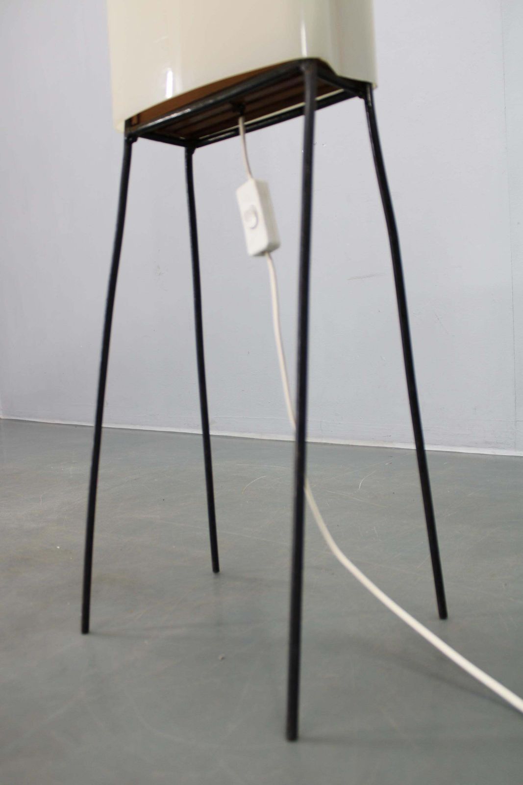 photo furniture Mid Century Modern Floor Lamp On Iron Legs With Plastic Shade And Wood Accent
