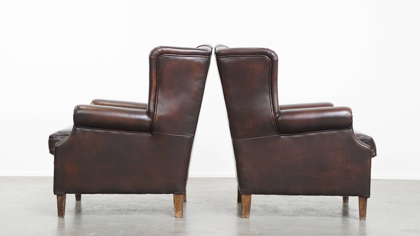 Comfortable And Very Beautiful Set Of 2 English Style Cowhide Wing Chairs With A Luxurious Finish photo Furniture