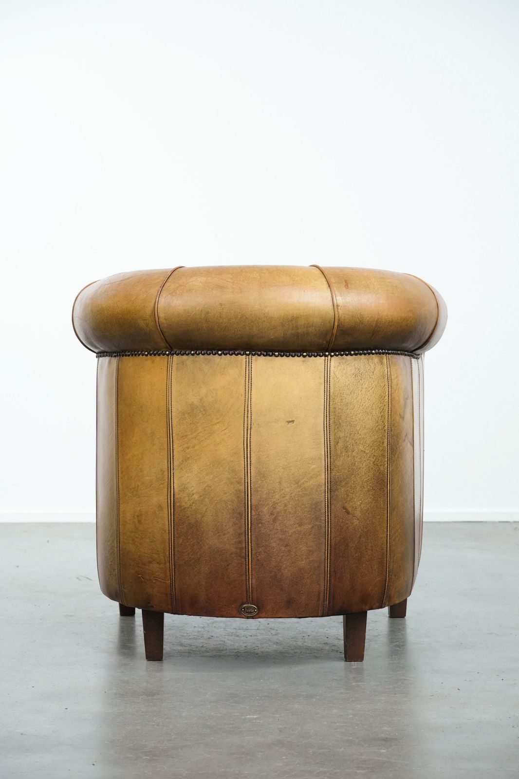 Elegant Sheepskin Club Armchair With Beautiful Warm Colours, A Finish With Decorative Nails And Beautiful Stitching photo Furniture