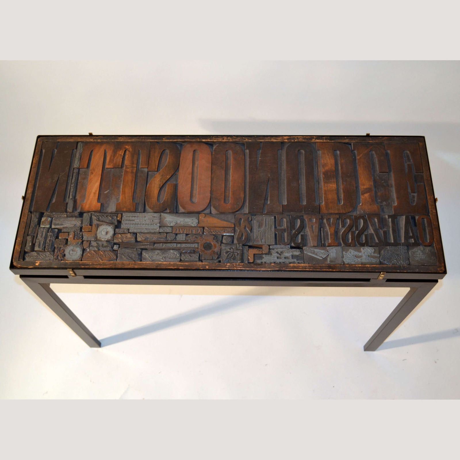Console With Wood Relief Top And Glass On Black Metal Frame photo vinterior