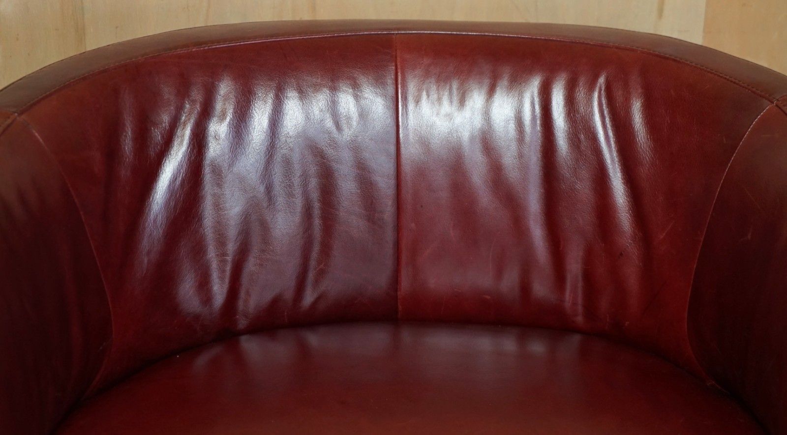 photo for sale Pair Of Exquisite Bordeaux Leather Natuzzi Swivel Armchairs With Lumbar Cushions