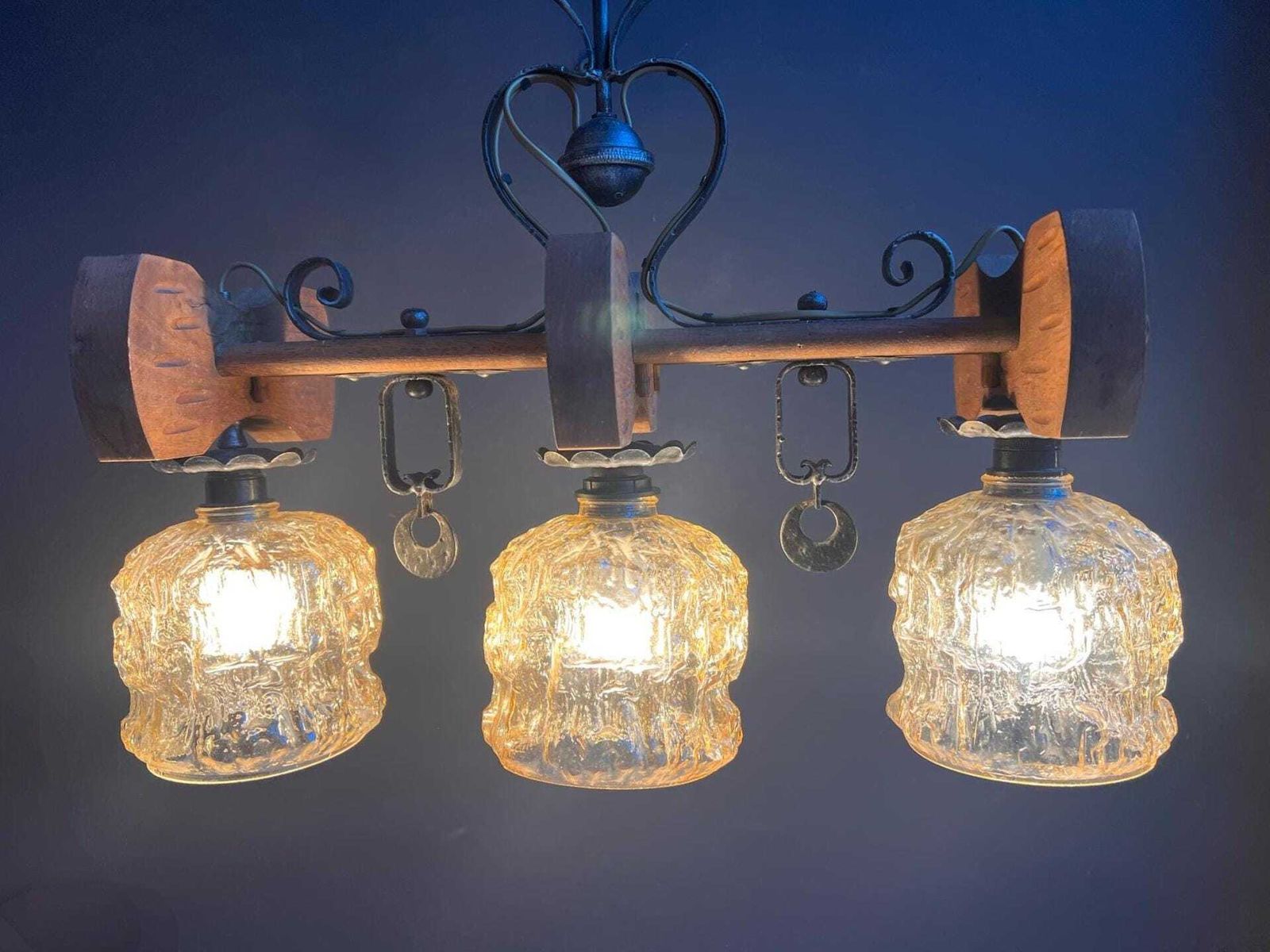 590.0 Vintage Rustic Mid Century Chandelier: Spanish Revival Wood Beam, Cracked Ice Amber Glass photo
