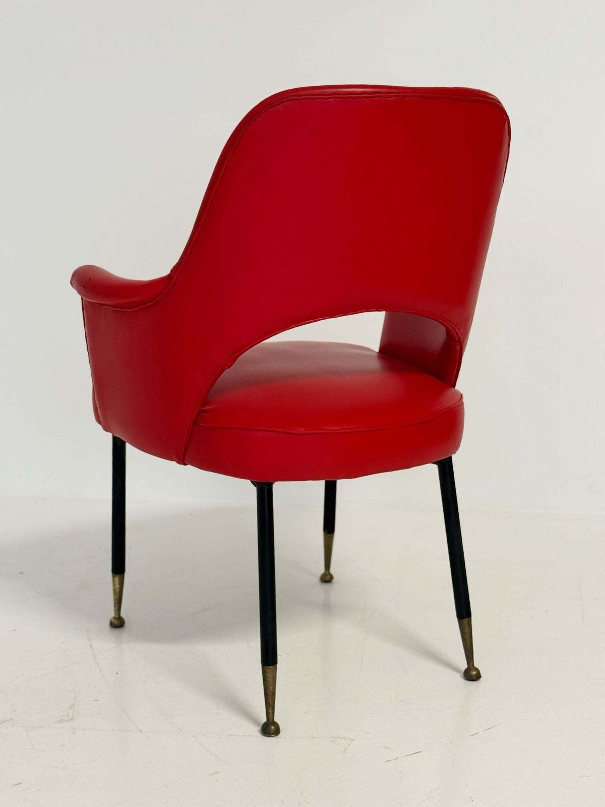 1950s Italian Armchair In Red Vinyl, With A Contoured Back And Open Back. photo for sale