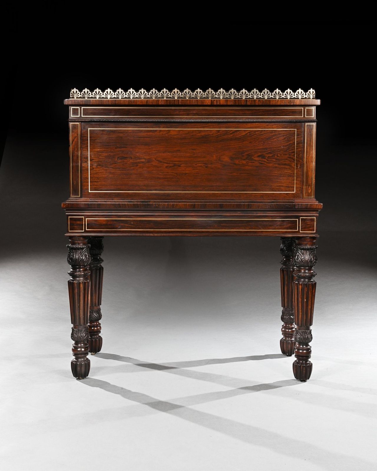 photo furniture An Extremely Fine Rosewood And Brass Inlaid Writing Table Attributed To Gillows Oxford Street Workshop