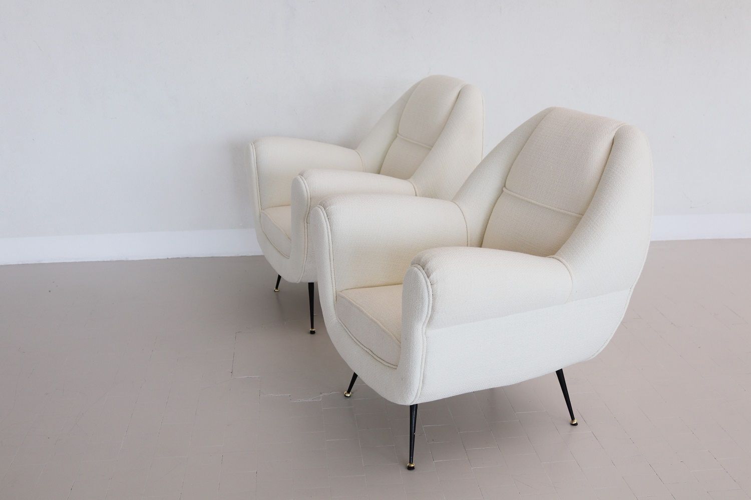 Furniture Italian Midcentury Armchairs In Off White Upholstery And Brass Stiletto Feet, 1950s photo