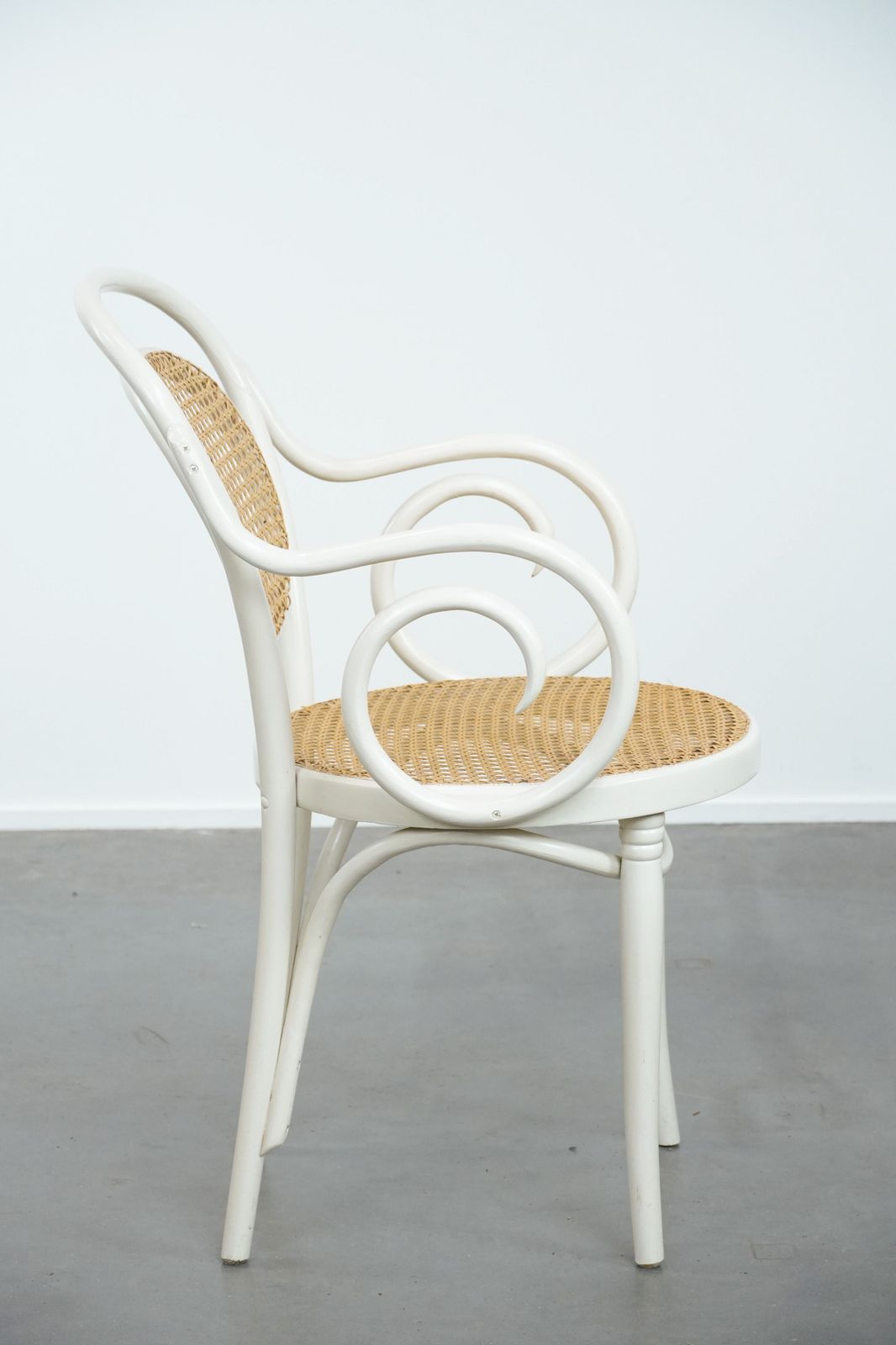 Vintage White Bistro Chair With Armrests In Thonet Style With A Graceful Curved Wooden Frame, Webbing Seat And Backrest photo for sale