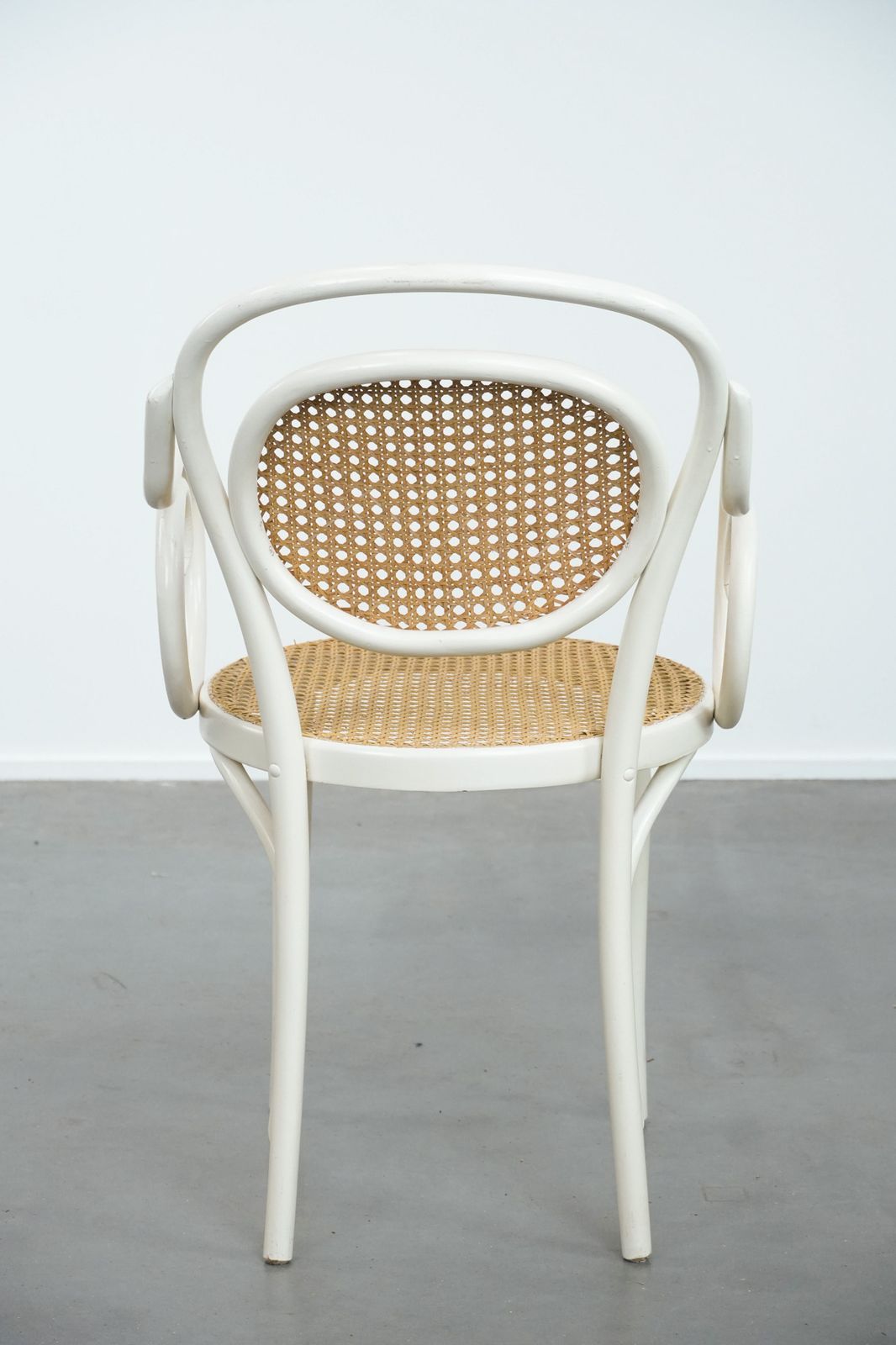 Vintage White Bistro Chair With Armrests In Thonet Style With A Graceful Curved Wooden Frame, Webbing Seat And Backrest photo Furniture